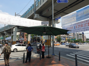 그늘막으로 코로나19 예방 수칙 전한다… 광진구, 전국 최초‘말하는 그늘막’설치
